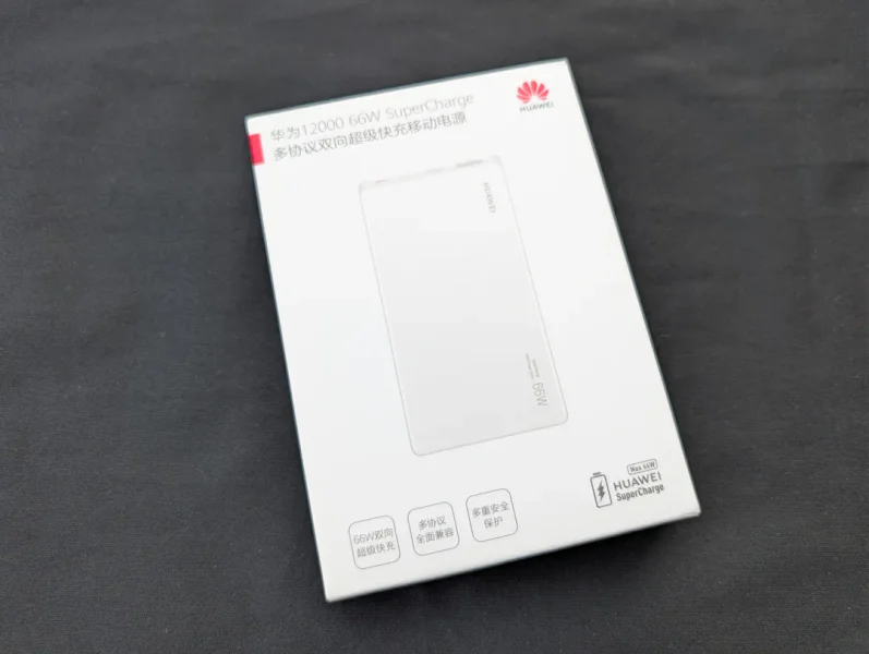Huawei 12000 66 W SuperCharge Power Bank — envelope, modem, binder