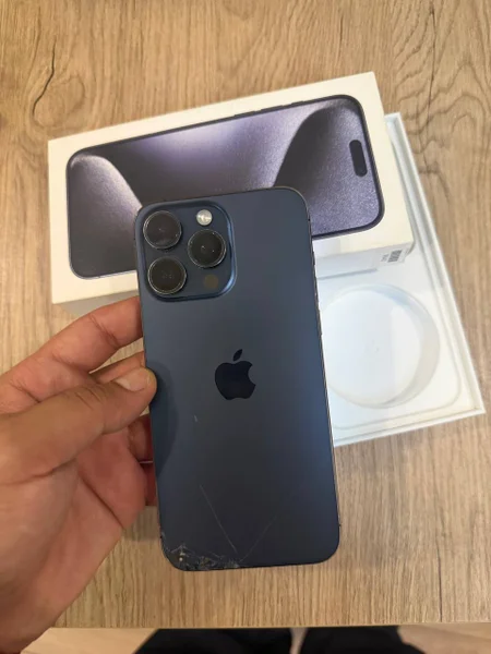 iPhone 15 Pro Max 256GB — joystick, remote control, can opener