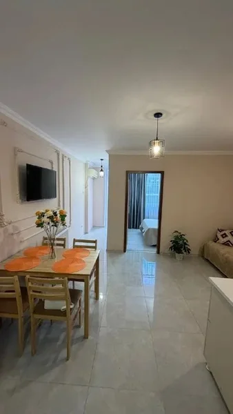 Квартира 1+1 — patio, home theater, dining table