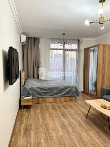 Студия в Bagrationi Residence — four-poster, studio couch