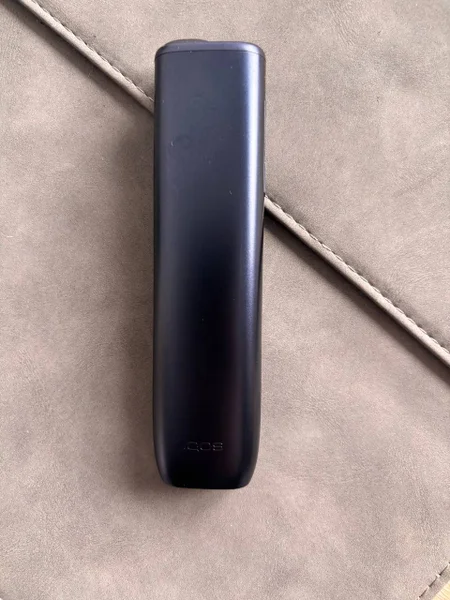 IQOS ILUMA i ONE — lighter, modem