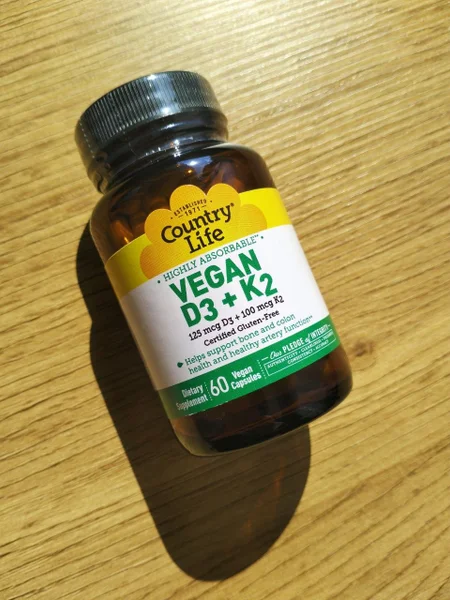 Веганские витамины D3 + K2 — pill bottle