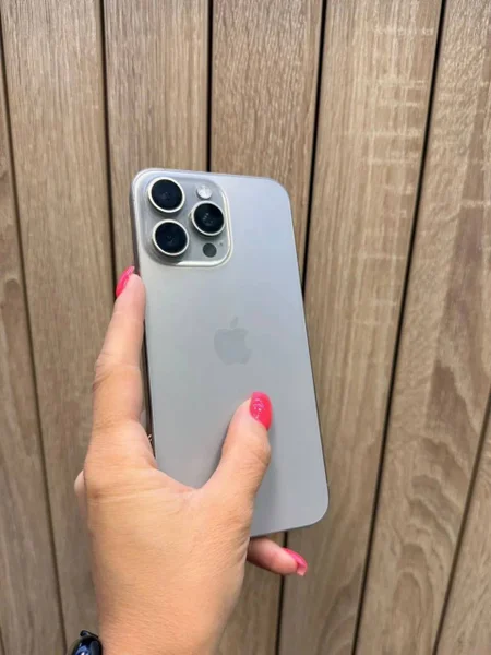 iPhone 15 Pro Max 256GB — remote control, cellular telephone, joystick
