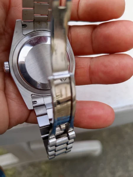 Механические часы с синим циферблатом — cellular telephone, digital watch