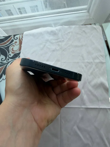 iPhone 14 128GB — remote control, hand-held computer, harmonica