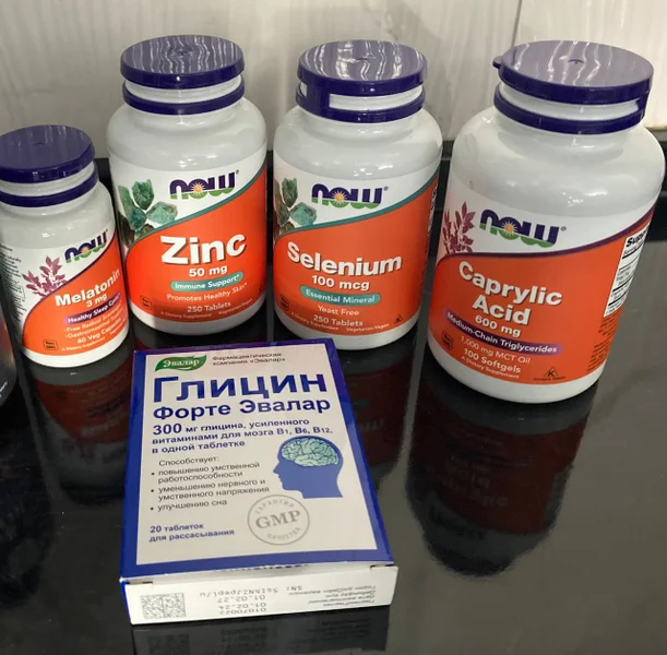 Melatonin 3 mg NOW — pill bottle, water bottle