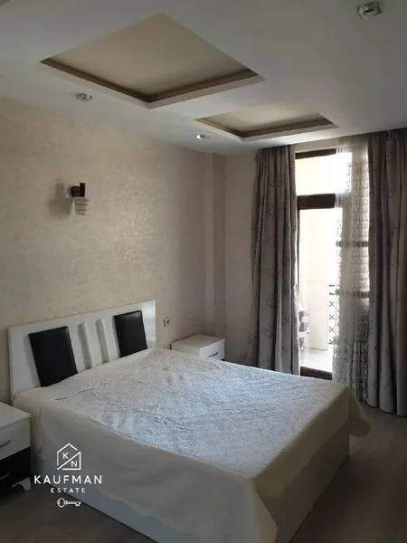 Квартира 2+1, 90 м² — home theater, dining table, studio couch