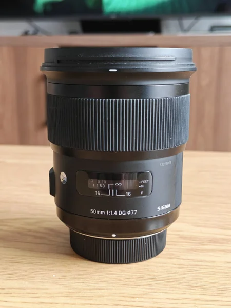 Объектив Sigma 24mm F1.4 HSM ART Nikon F — reflex camera, lens cap