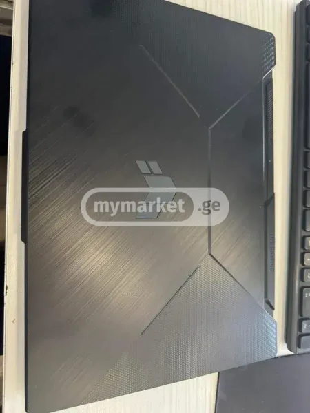 Ноутбук ASUS TUF (AMD Ryzen 7 5800H, RTX 3060, 16GB RAM, 1TB SSD) — street sign