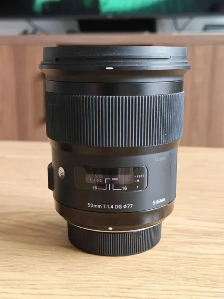 Объектив Sigma 50 mm F1.4 HSM ART Nikon F — reflex camera