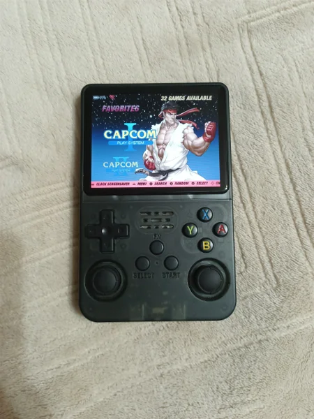 Портативная игровая консоль R36S 64GB — hand-held computer, remote control, cellular telephone