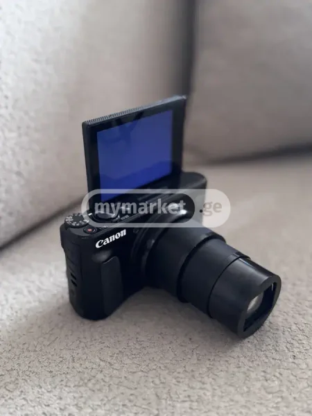 Фотокамера Canon — reflex camera, loupe