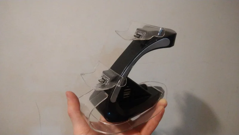 Докстанция для двух гейпадов PS4 — can opener