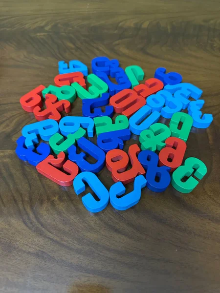 Деревянный грузинский алфавит и игрушки — rubber eraser, jigsaw puzzle