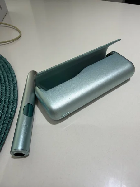 IQOS Iluma Prime — lighter, fountain pen, lipstick
