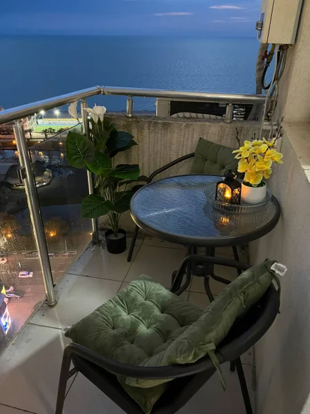 Студия у моря — patio, dining table