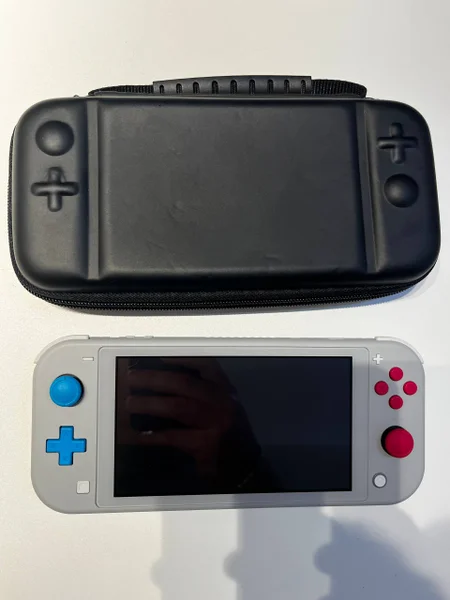 Nintendo Switch Lite — cellular telephone, microwave, hand-held computer