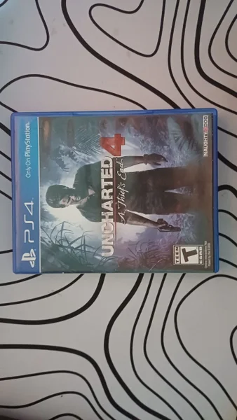 Диск Uncharted 4 — book jacket, binder