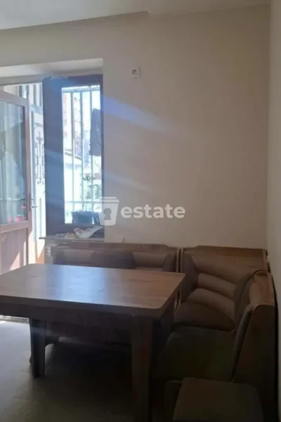 Уютная квартира 1+1, Табидзе 37 — dining table, home theater
