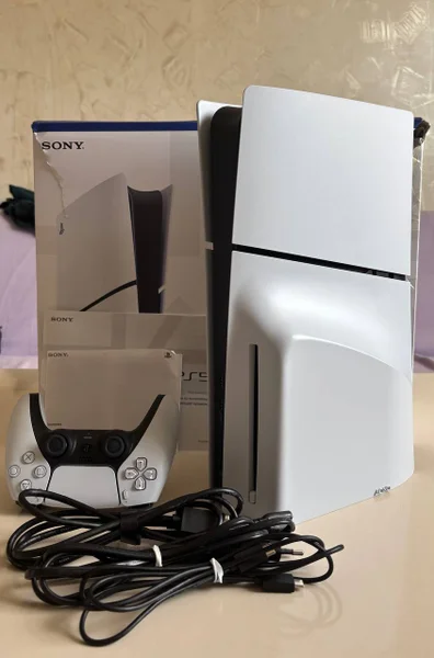 PlayStation 5 Slim — soap dispenser, modem