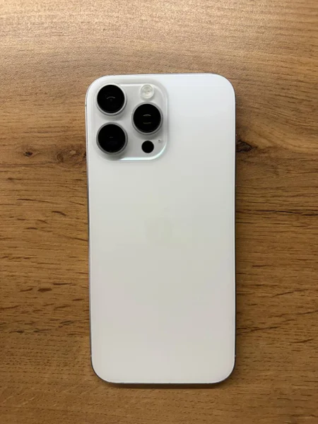 iPhone 16 Pro Max — remote control, can opener, switch